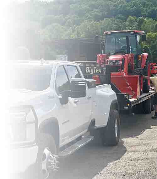 Truck Hauling Loader