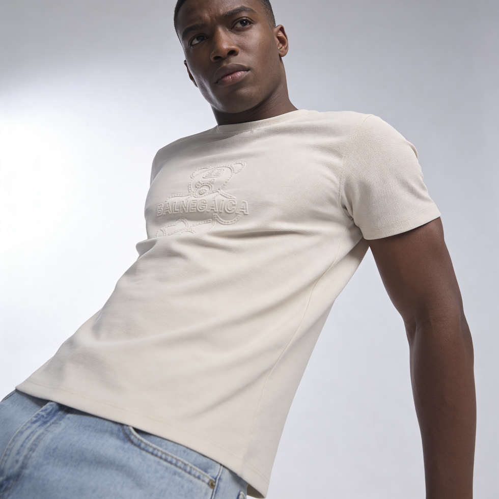 Man wearing light graphic textured t-shirt