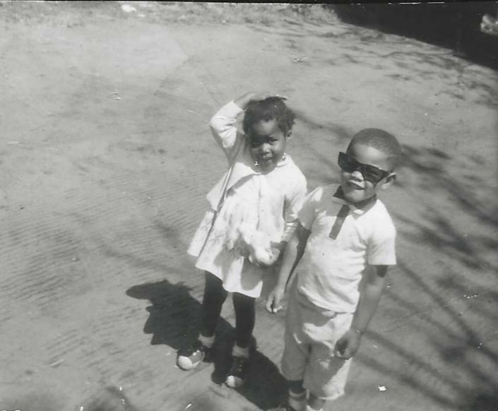 My cousin Lori and I are in the backyard of 1534 Picquet Ave, Augusta, GA, circa 1966