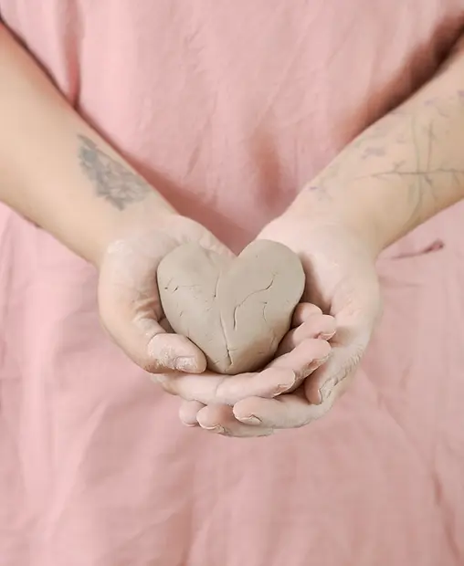 Heart Shaped Ceramic Clay in Hands