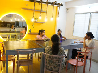 Common room for meetups at Oasis Girls Hostel