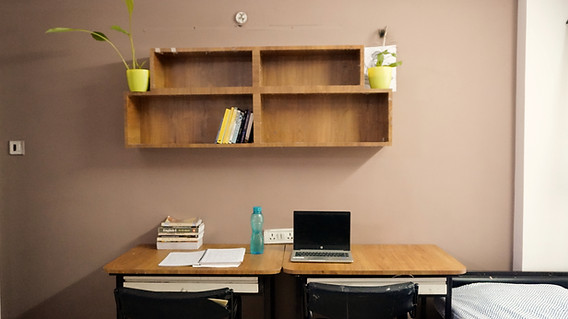 Study Area of Oasis Girls Hostel Room