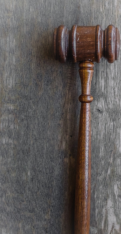 brown mallet on gray wooden surface_edit