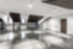 Modern empty room with reflective concrete floor