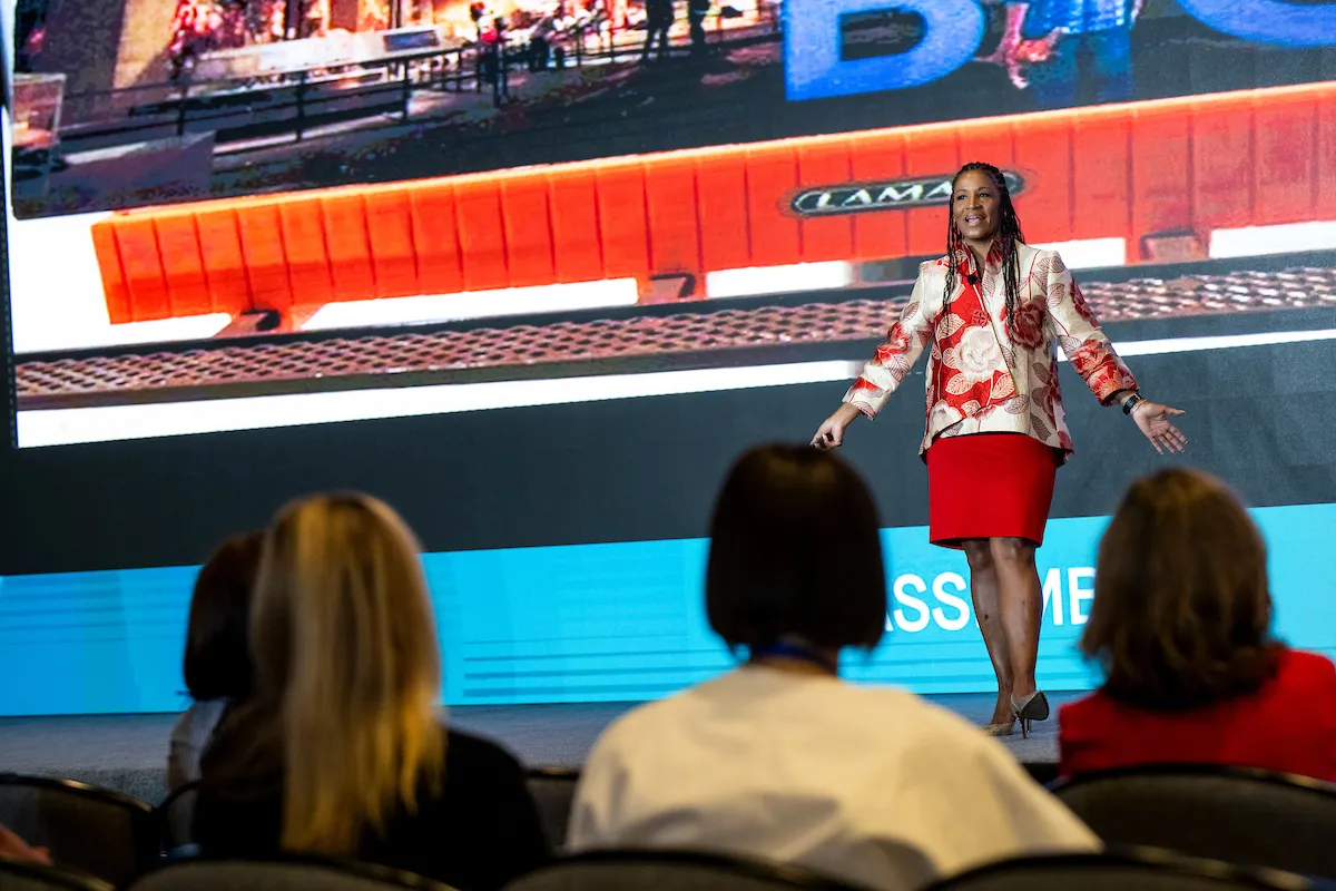 Noelle LeVeaux delivering the main-stage keynote at the North American Marketing Leadership Summit