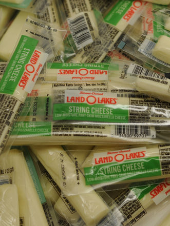 Large pile of Land O'Lakes Mozzarella Cheese Sticks