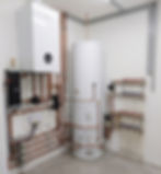 Worcester Bosch system boiler, unvented cylinder and underfloor heating manifolds in a plant room in Petts Wood