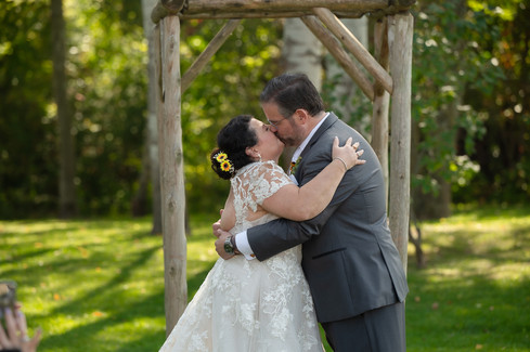 Wedding kiss at Holland Marsh Winery by Little Blue Lemon