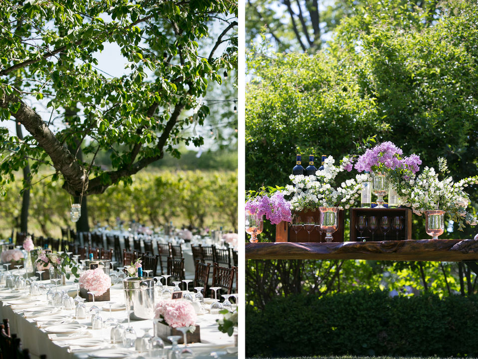 A rustic vineyard wedding styled with pink floral decor, chunky wood tables lined with lace & pinky purple flowers.