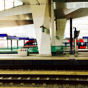 At the Vienna train station - Wien Hauptbahnhof - with a high speed train in the background