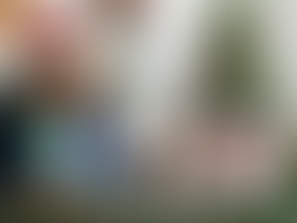 Happy realtor using AI to create holiday marketing. 