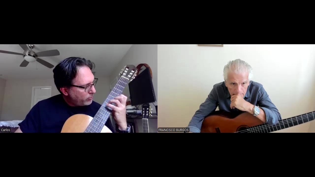 close up of guitarist hands performing expert technique on instrument