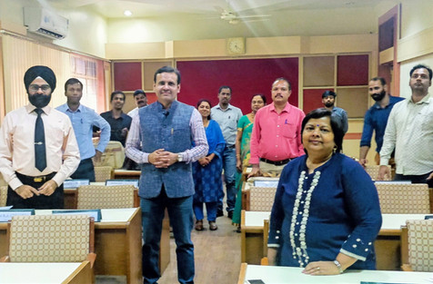 Group photo with Dr. Vivek Modi at a meeting