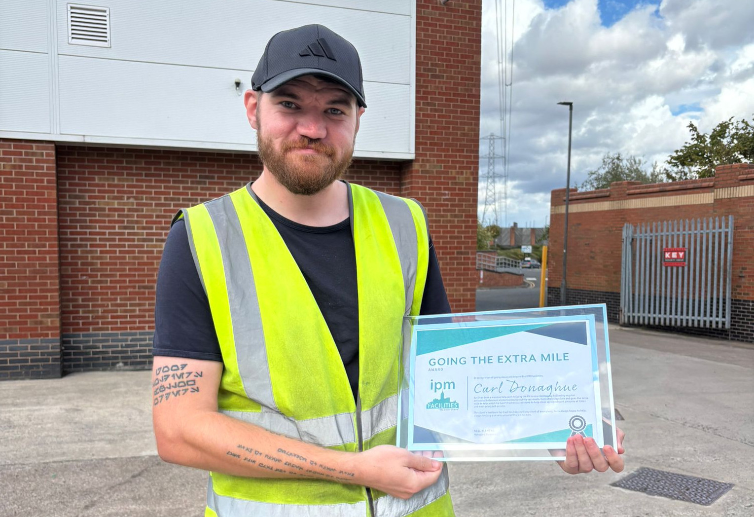 Carl accepting his GEM award certificate