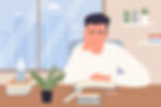 A man works reads at his desk begrudgingly