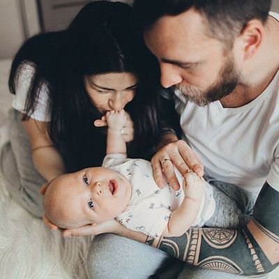 Breastfeeding Parents Mom and Dad with Infant