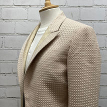 Beige Frock Coat With Inset Lapel.  Built For/Cut By: Marvin Schlichting - Felsen Tailors.  Designed By: Santo Losuasto for "The Music Man"