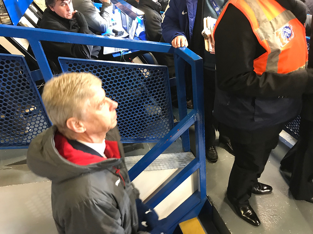 Arsene Wenger in the Chelsea press box. Photo by Paul Lagan