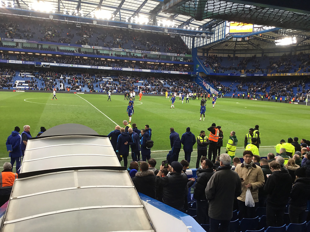 Chelsea players trudge off the Stamford Bridge pitch humbled in 3-1 defeat to Spurs. Photo by Paul Lagan