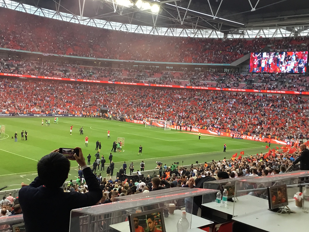Jubilant Manchester United fans celebrate FA Cup semi-final win over Spurs Photo by Paul Lagan