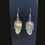 Thumbnail: Manifestation Skull Dangle Earrings
