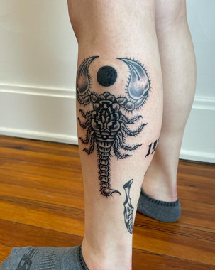 traditional blackwork scorpion leg tattoo chattanooga