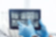 dentist showing x-rays on the tablet