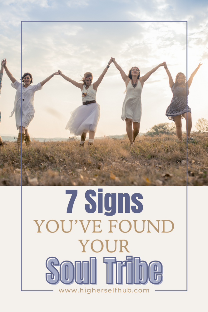 A social media post showing people jumping joyfully on a hilltop, with text "7 Signs You've Found Your Soul Tribe" and website URL www.higherselfhub.com