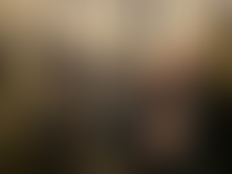 Brooklyn Amity School seniors working together to solve puzzles inside the RIKERS, 1932 escape room in Manhattan, surrounded by prison-themed props and dim lighting.