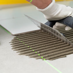 tiler-working-renovation-apartment (2).jpg