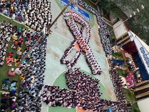LARGEST CERVICAL CANCER AWARNESS LOGO FORMED BY 1111 STUDENTS