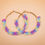 Thumbnail: Pastel Rainbow hoop earrings, made from crocheting silk thread and Goldwork Pearl Purl Embroidery.