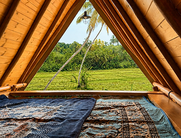 A quiet net bed inside the Private Pool Cabana overlooking the rice fields in Tangalle, Sri Lanka