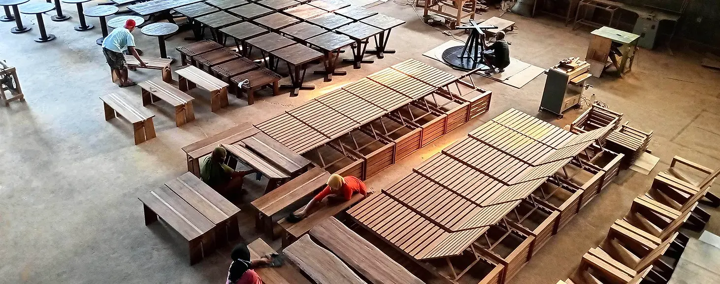 Ed and Coco artisans handcraft teak furniture in Jepara, Indonesia, guided by Bali-born design — showcasing true Indonesian craftsmanship.