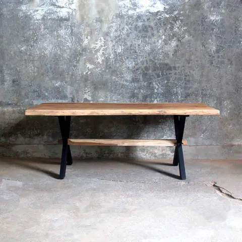 Live edge teak dining table with X-shaped black iron legs, handcrafted in Jepara with modern industrial design.
