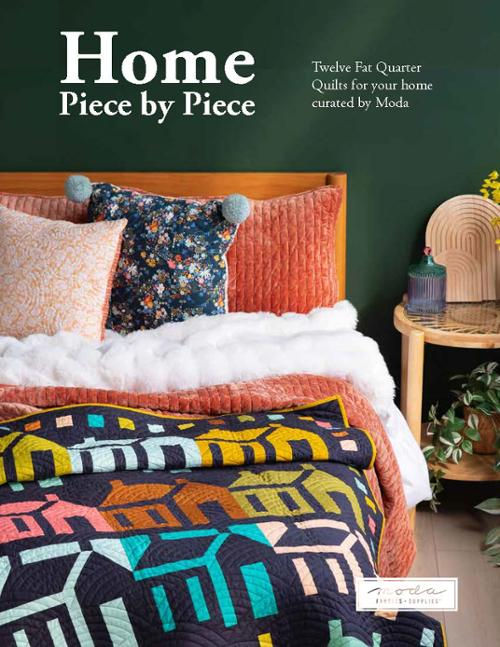 Cover of pattern book with title "Home Piece by Piece" with a bed, colorful throw pilloss and quilt