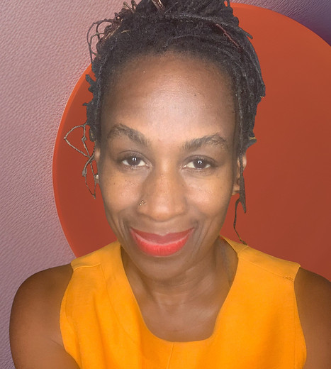 HeadShot_MarciaElizabethThompsonDACM_Orange_FrontFacing_FlatlayBackground-Photoroom.jpg