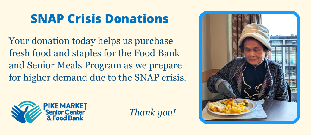 Senior Center member sitting alone eating breakfast