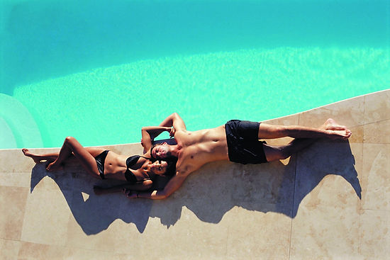couple beside the pool_edited.jpg