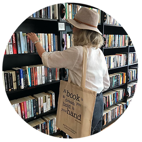 Image of shopper browsing the books available at our bookshop & hearing support centre at No 8 The Old Bookshop in Downham Market
