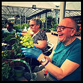 WNDA-Groups-Chat club attendees tending to plants as part of a day out to the garden centre