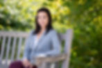 Latina posing for a picture outdoors