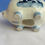 Thumbnail: bottom of large delft blue handpainted piggy savings bank with flowers and a windmill decoration beautiful gift from Holland
