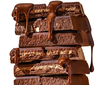 Hu's New Milk Chocolate Packaging Highlights The Chocolate Bar's Creaminess Through A Milk