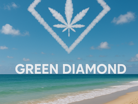 Cloud-formed Green Diamond CBD logo with cannabis leaf floats above a clear blue sky at a tropical beach, with turquoise ocean waves and golden sand in the foreground.