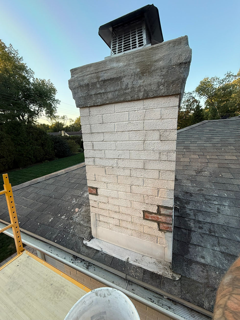 Chmney Brick Replacement and Cap Repair After 2