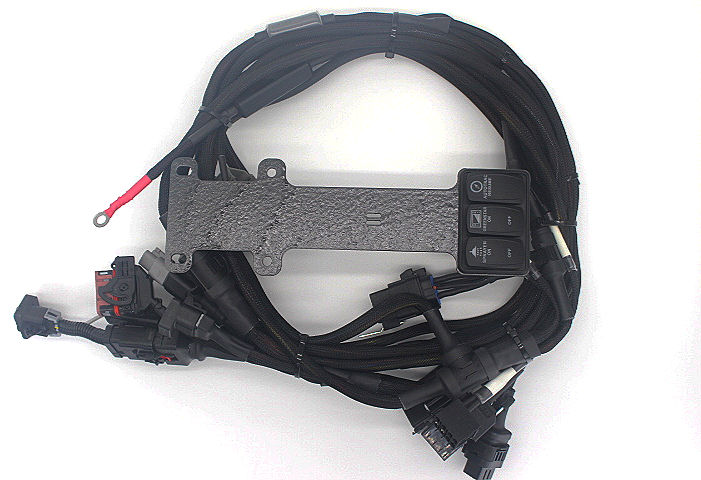 Top-down view of bundled GreenStar Side by Side Harness with connectors and switches for John Deere GreenStar displays, StarFire receivers, and compatible ATV platforms.