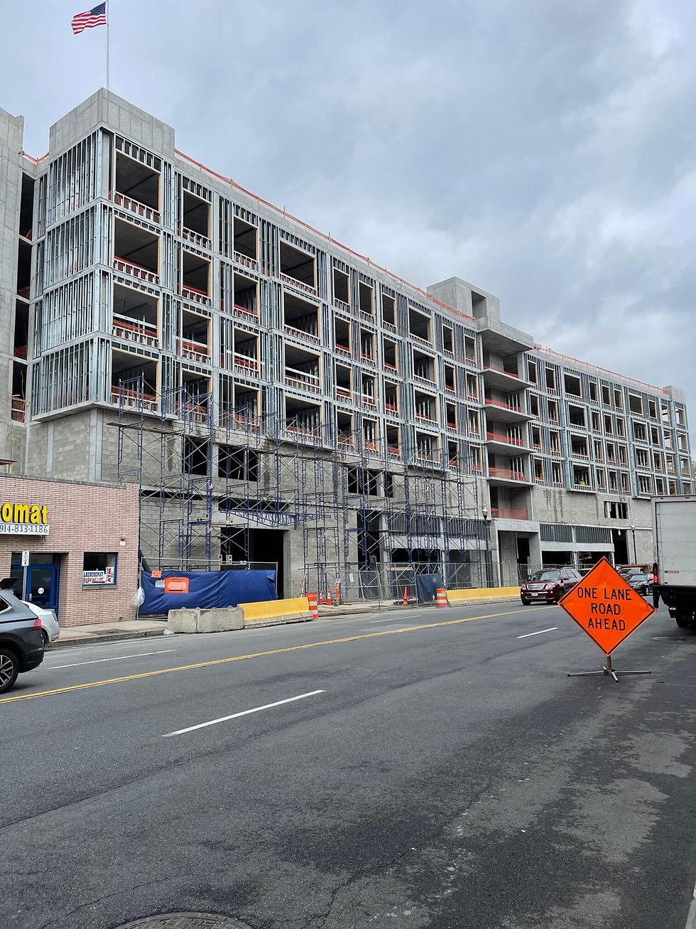 Black and white photo of building in construction