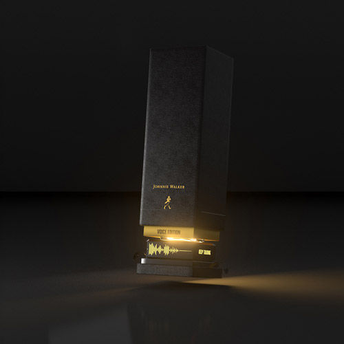 Custom Johnnie Walker whisky presentation box with illuminated base and audio record and playback — packaging production by Production Partners