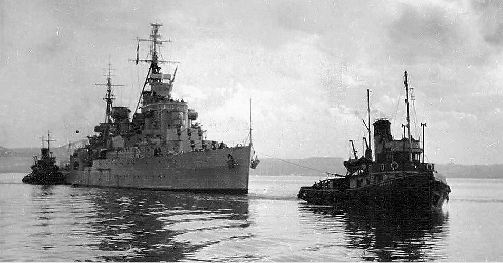 HMS Superb being towed.jpg